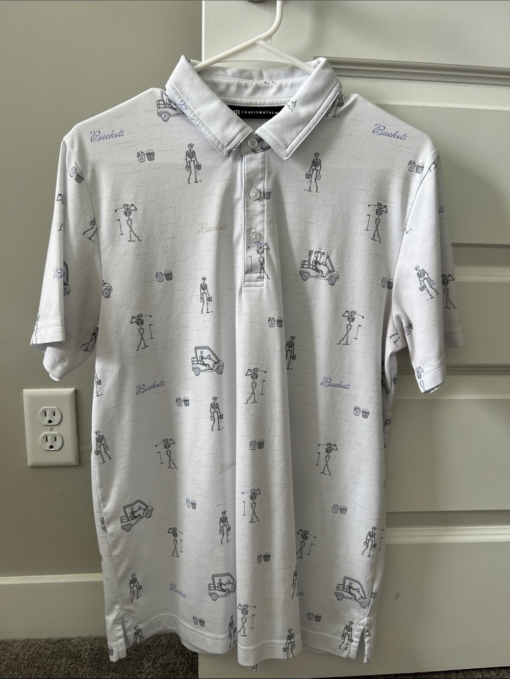 Travis Mathew White Polo with Navy Golf Print